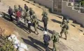 مداهمات واعتقالات طالت 5 مواطنين وتفجير منزلاً في الضفة والقدس